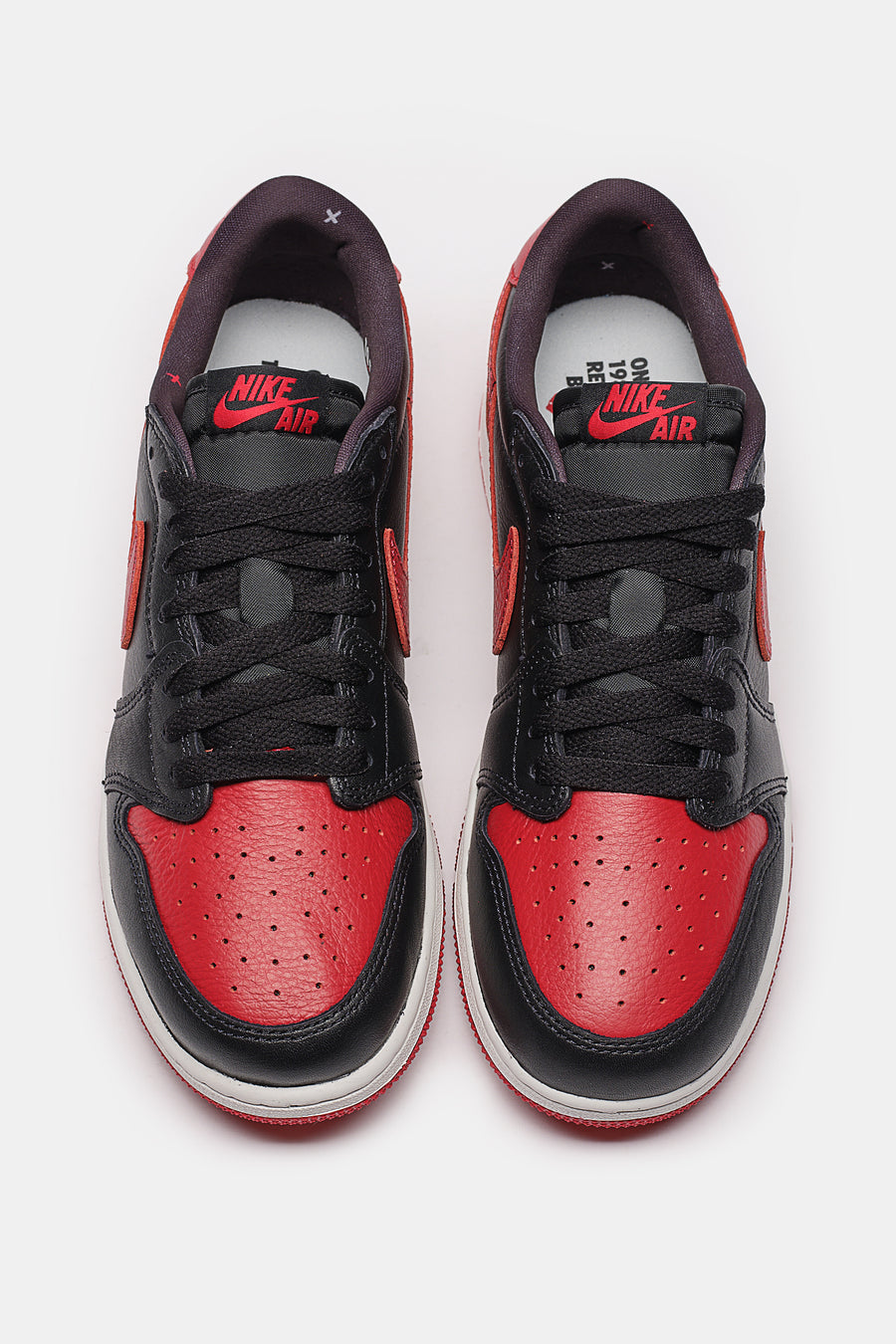 Jordan Air Jordan 1 Retro Low OG Big Kids Sneaker in Black/Black/Varsity Red/Summit White - Notre