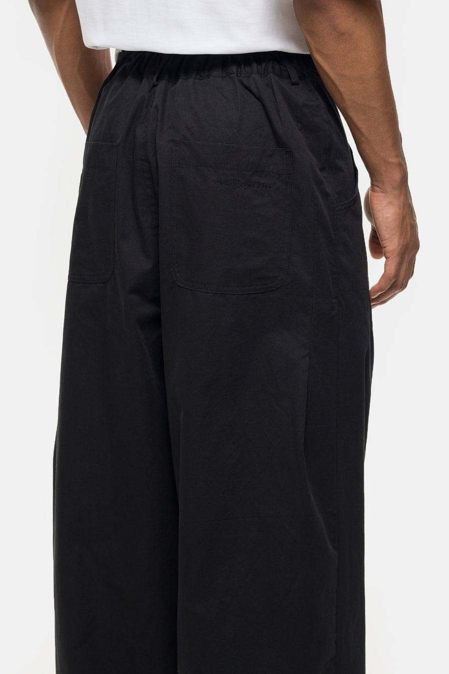 Estudio Niksen Back-Pleat Cotton Trouser in Black - Notre