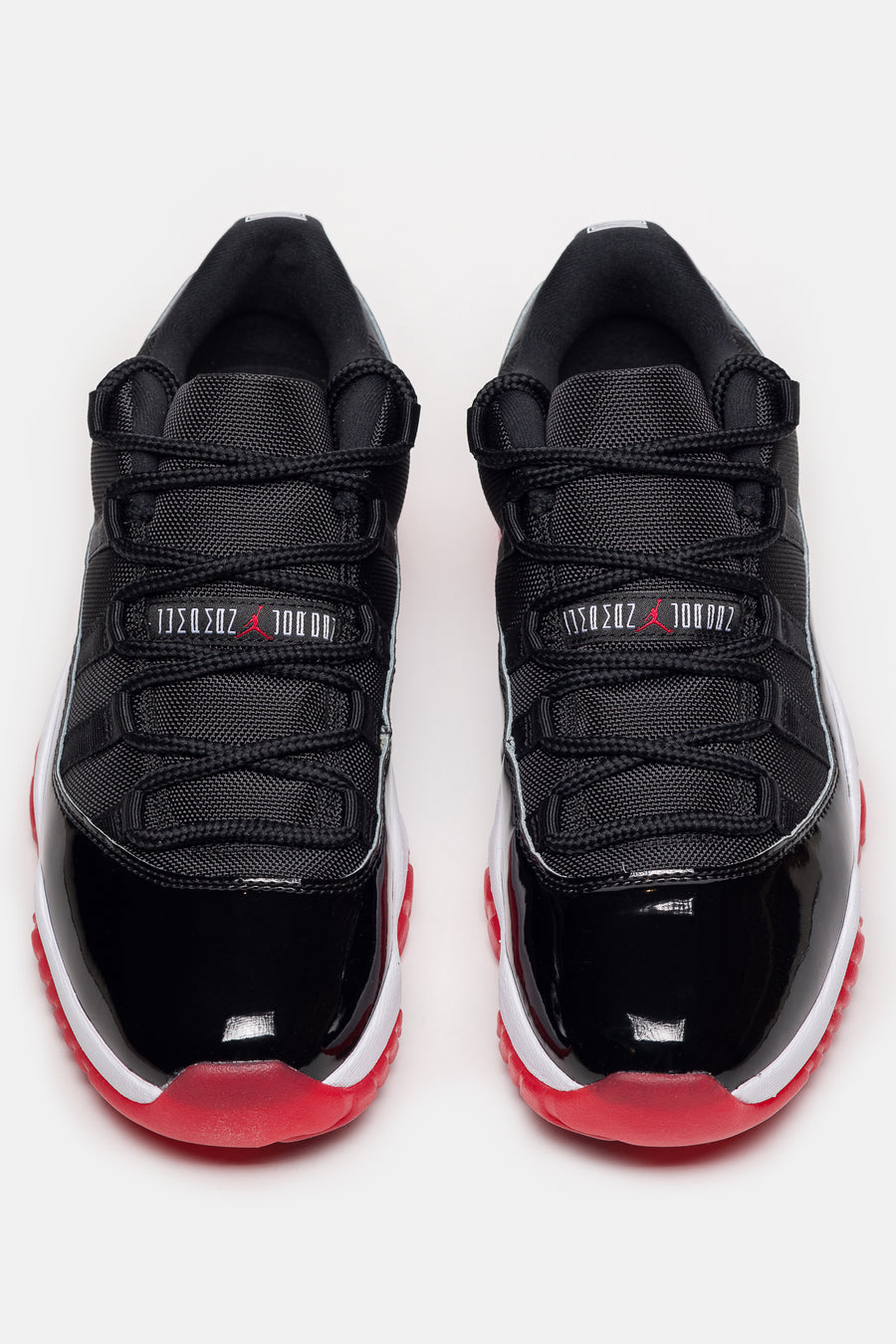 Air Jordan 11 Retro Low Sneaker in Black/Varsity Red/White Air Jordan 11 Retro Low Sneaker in Black/Varsity Red/White