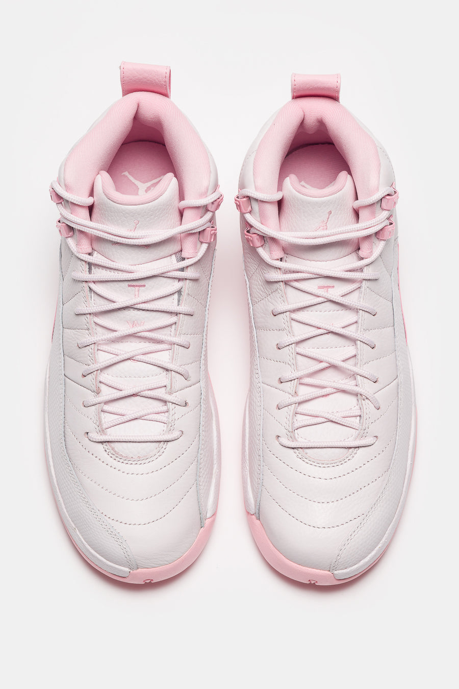 Air Jordan 12 Retro Big Kids Sneaker in Pearl Pink/Medium Soft Pink