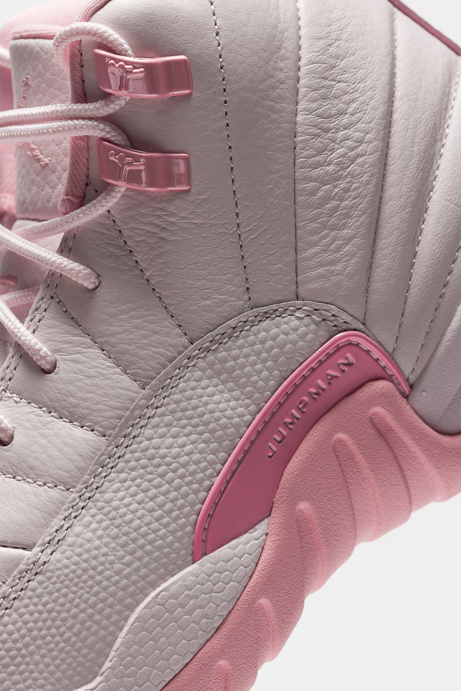 Air Jordan 12 Retro Big Kids Sneaker in Pearl Pink/Medium Soft Pink