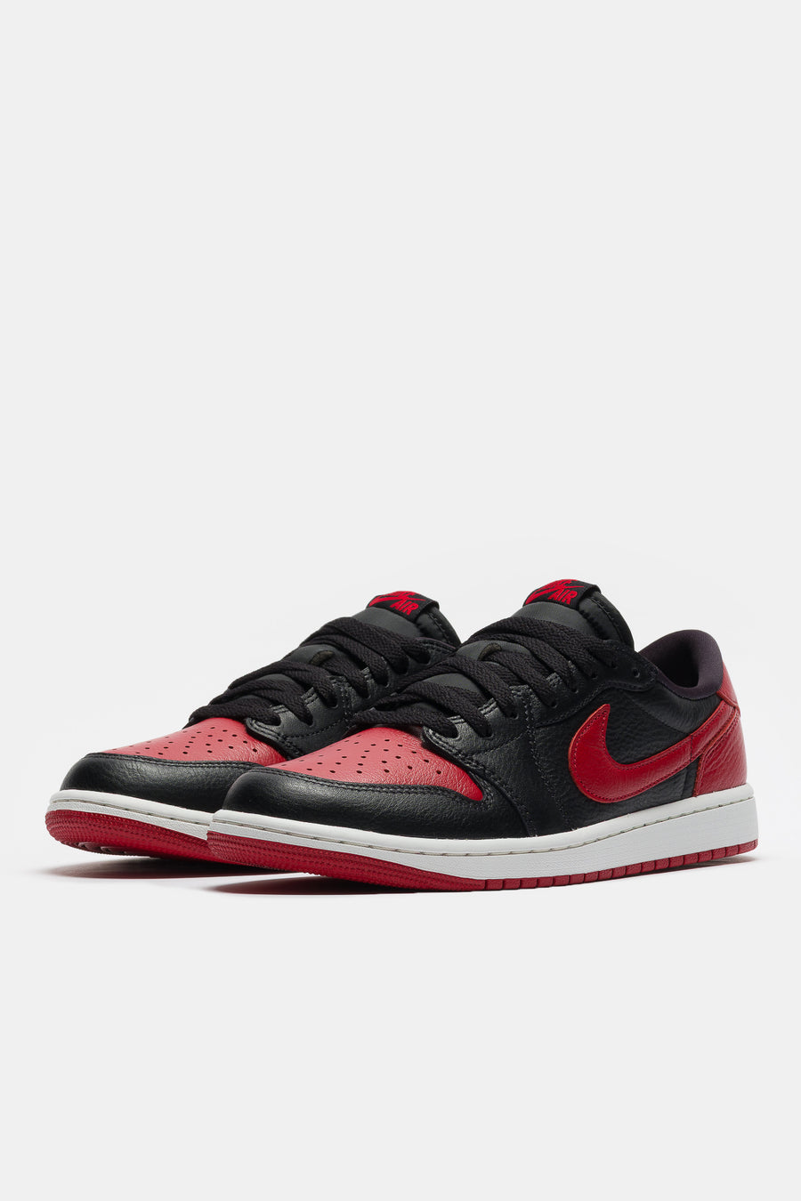 Jordan Air Jordan 1 Retro Low OG Sneaker in Black/Black/Varsity Red/Summit White - Notre