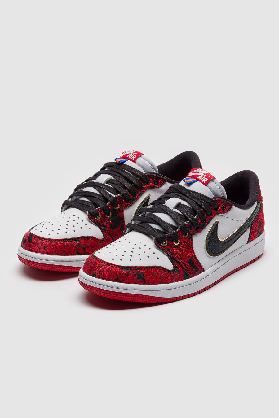 Jordan Air Jordan 1 Retro Low OG Sneaker in Black/Varsity Red/Summit White - Notre