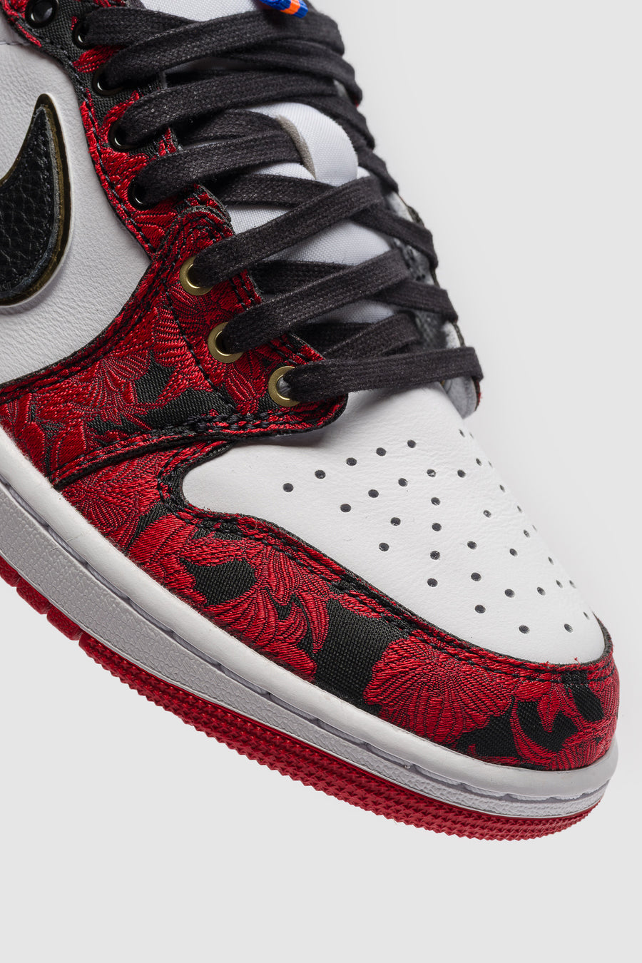 Jordan Air Jordan 1 Retro Low OG Sneaker in Black/Varsity Red/Summit White - Notre
