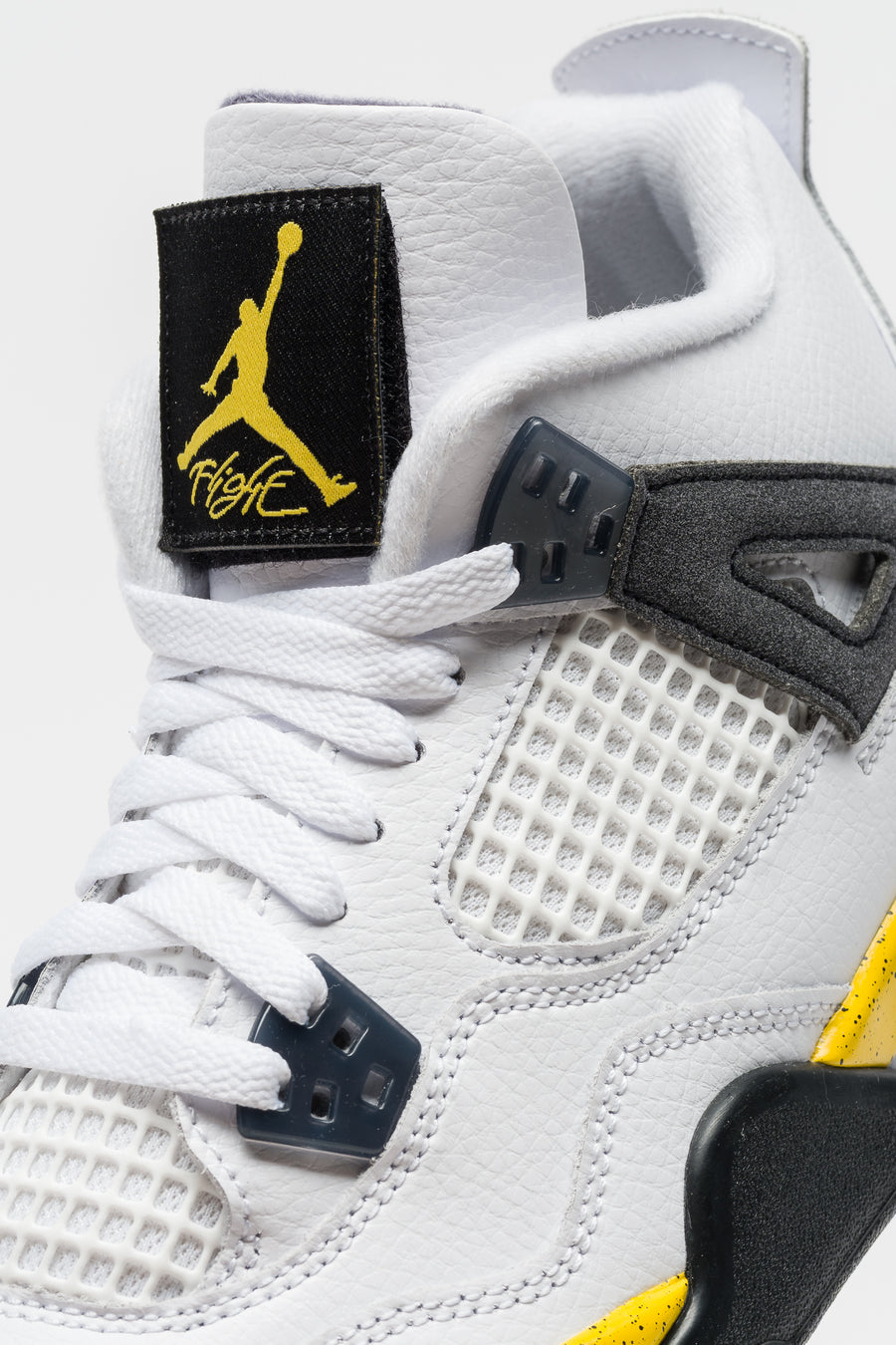 Jordan Air Jordan 4 Retro Grade School Sneaker in White/Tour Yellow/Dark Blue Grey/Black - Notre