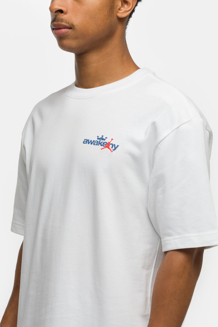 Jordan Awake NY T-Shirt in White/Light Blue/Game Royal/Infrared 23 - Notre