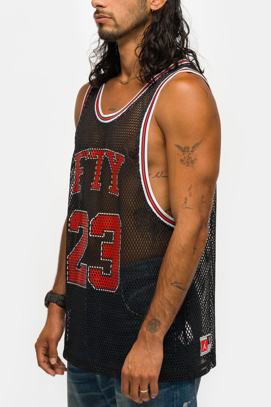 Jordan Free the Youth Basketball Jersey in Black/Light Crimson - Notre