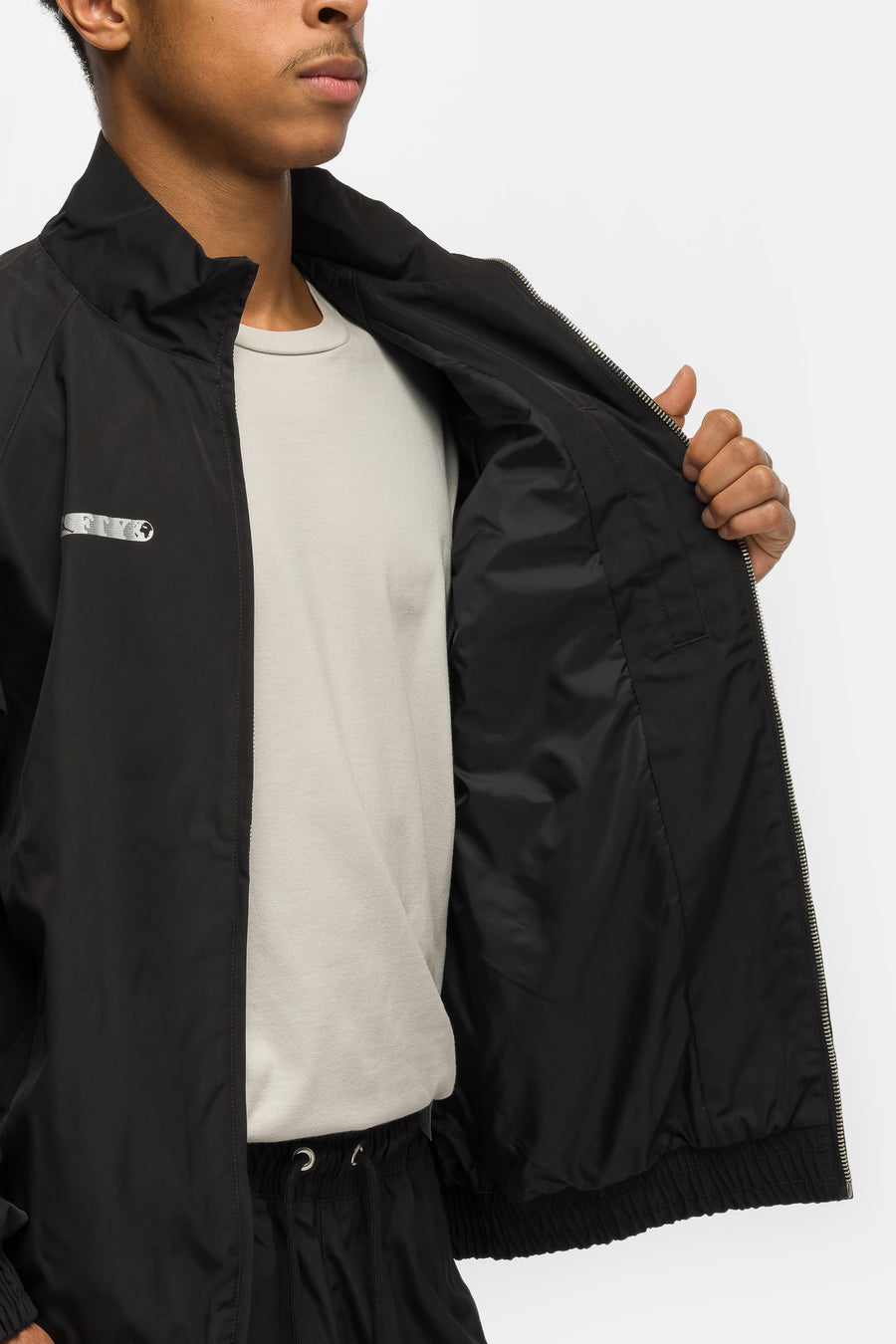 Jordan Free the Youth Track Jacket in Black - Notre