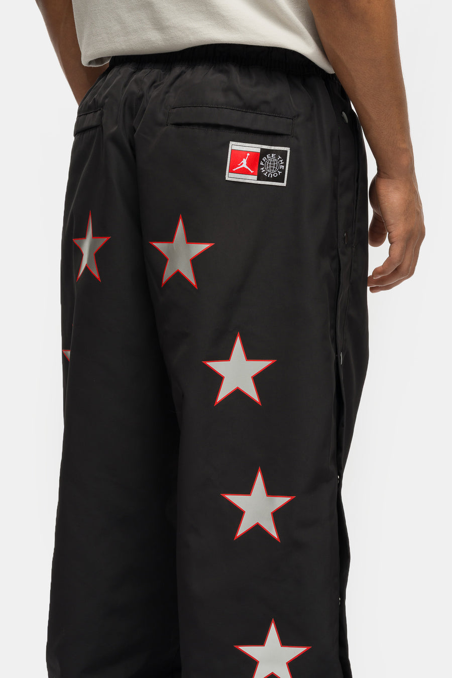 Jordan Free the Youth Track Pant in Black/Light Crimson - Notre