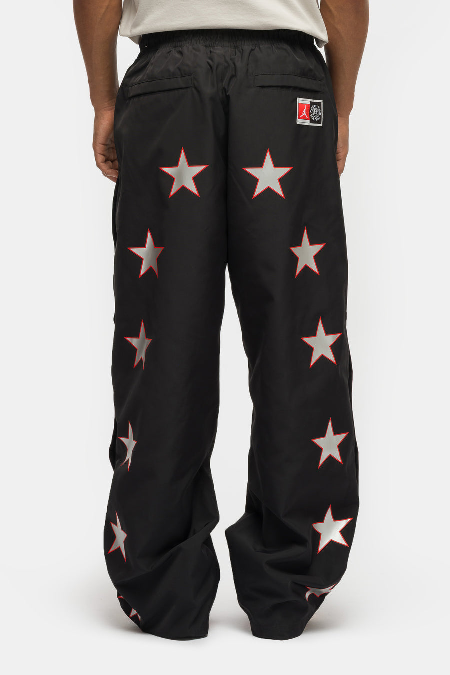 Jordan Free the Youth Track Pant in Black/Light Crimson - Notre