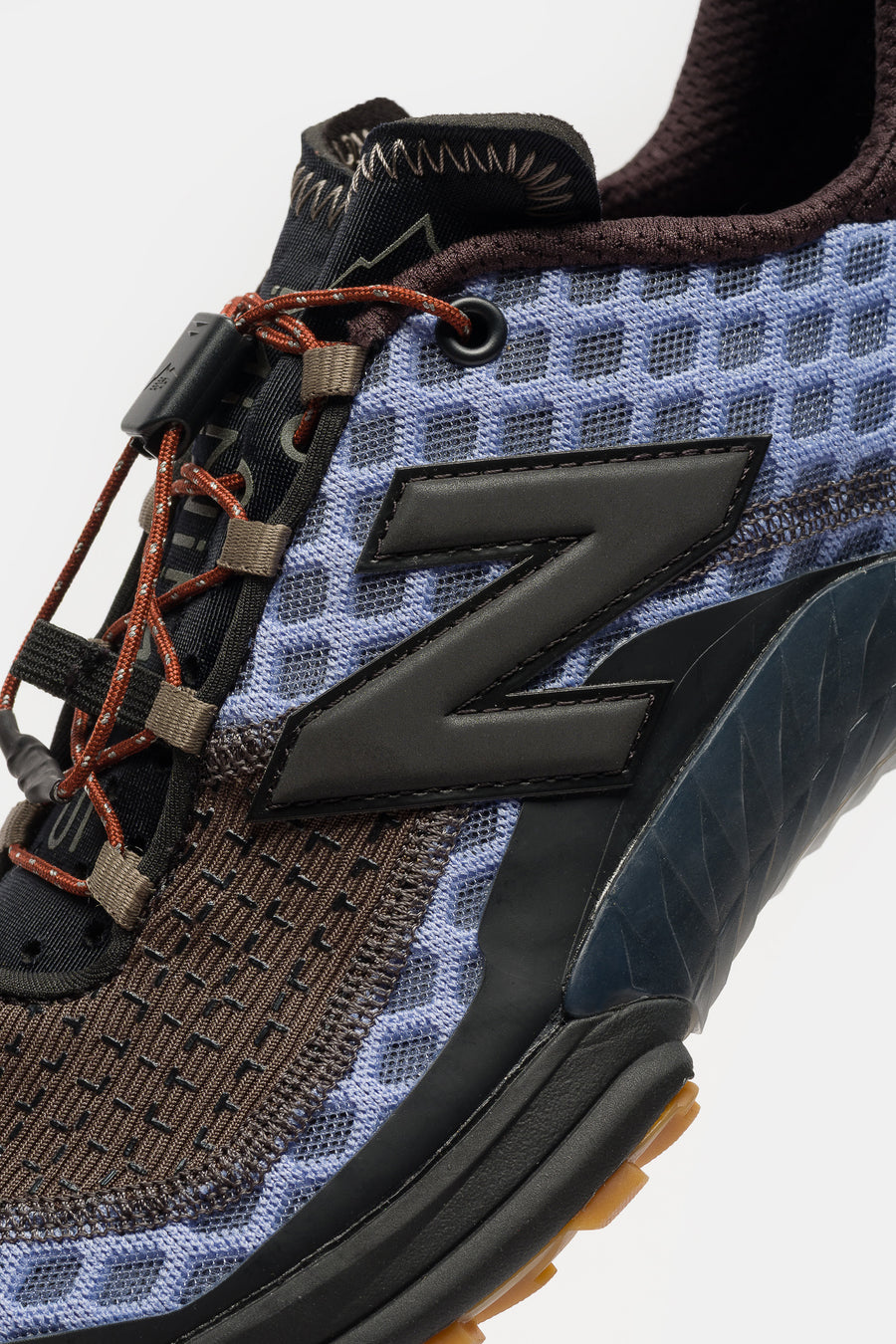New Balance Cayl M10L Sneaker in Black Ink/Lavender Lustre/Smoke Paprika - Notre
