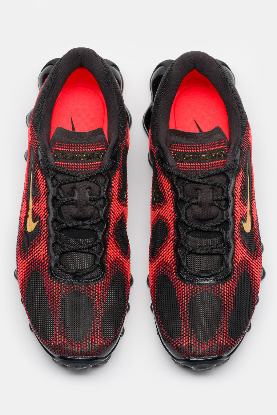 Nike Air Liquid Max Sneaker in Black/Metallic Gold/Team Red/Fire Red - Notre