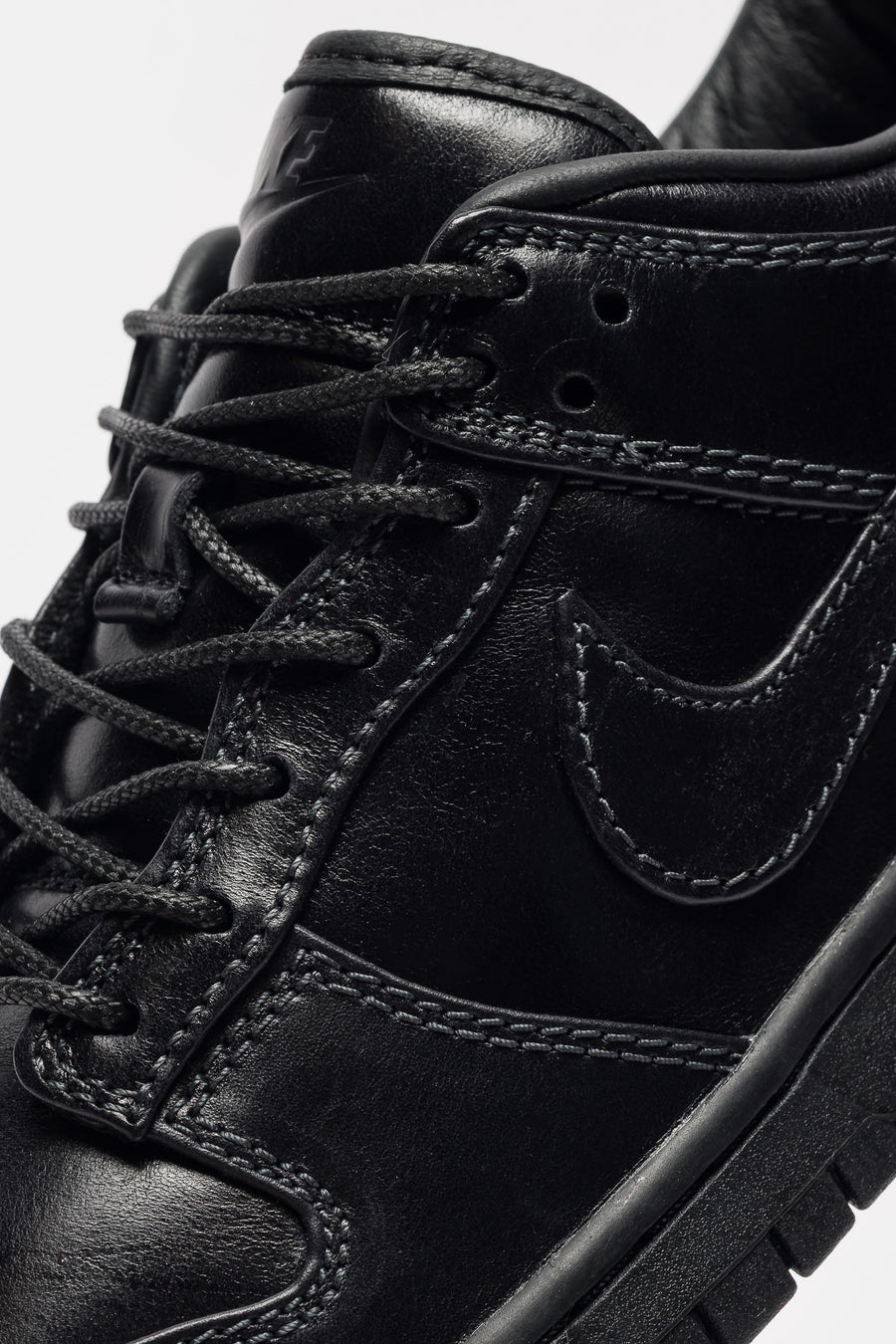 Nike Dunk Low Retro Premium Sneaker in Black/Black - Notre