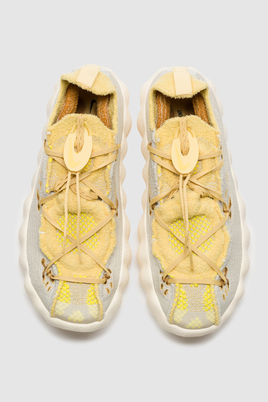 Mind 002 Flyknit Sneaker in Light Bone/Saturn Gold/Infinite Gold
