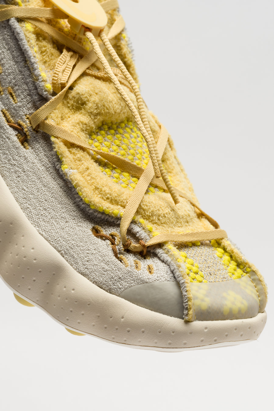 Mind 002 Flyknit Sneaker in Light Bone/Saturn Gold/Infinite Gold