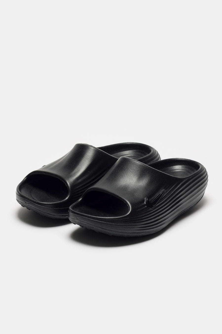Nike ReactX Rejuven8 Slide in Black/Black - Notre