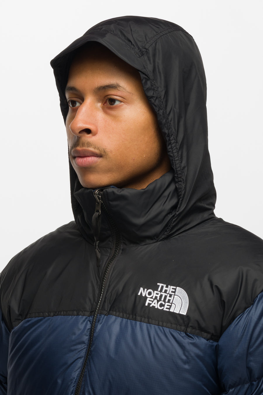 The North Face 1996 Retro Nuptse Jacket in Summit Navy/TNF Black - Notre