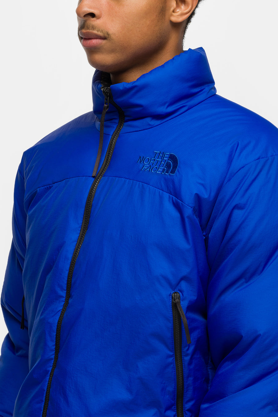 The North Face Pertex Nuptse Reversible Jacket in TNF Blue/TNF Black - Notre