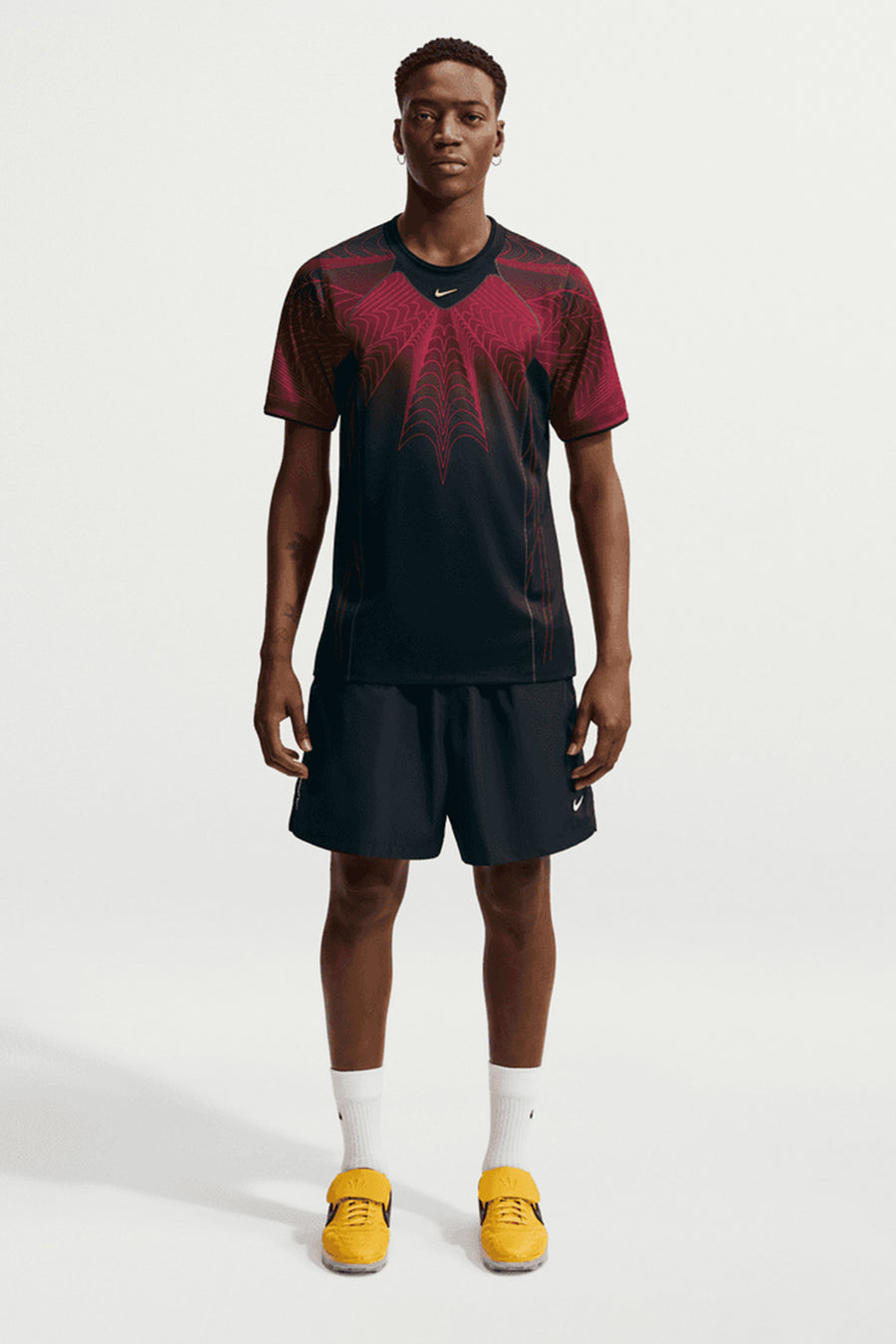 NOCTA x Canada Short Sleeve Top in Black/University Red/Sonic Yellow