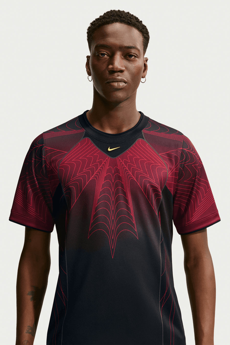 NOCTA x Canada Short Sleeve Top in Black/University Red/Sonic Yellow